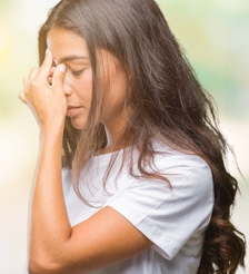 Young beautiful arab woman over isolated background tired rubbing nose and eyes feeling fatigue and headache. Stress and frustration concept. © Aaron Amat - fotolia.com Nachdenkliche Frau